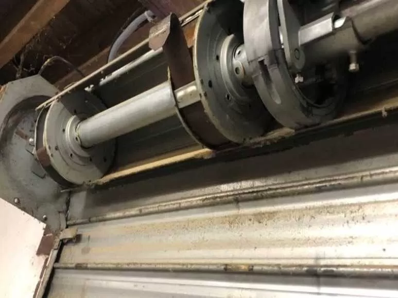 Changement moteur rideau métallique à 94440