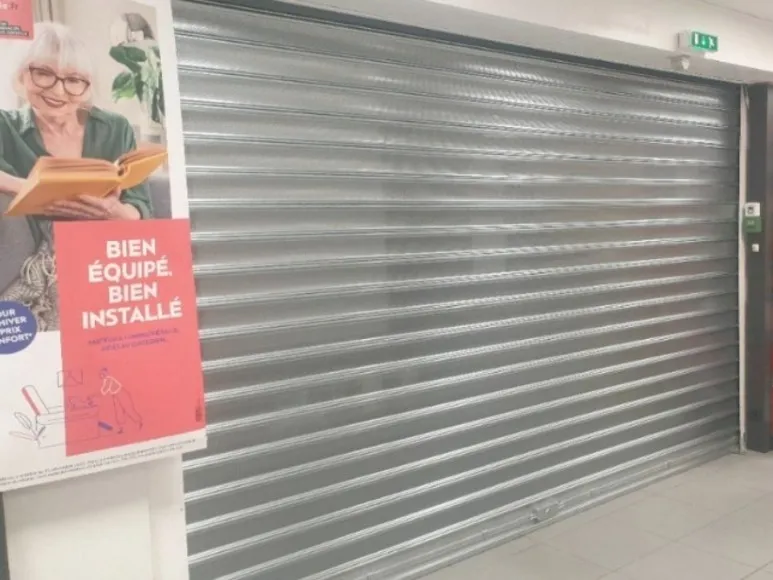 Installation de rideau métallique à 91440